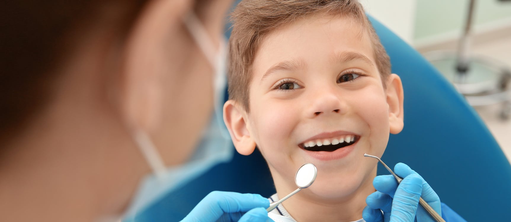 Kid at a Therapeutic Pulpotomy appointment with Dr. Kritika