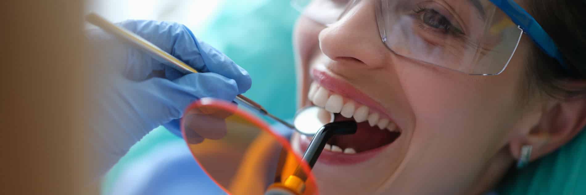 Woman at her restorative dental appointment in Pacific Grove CA