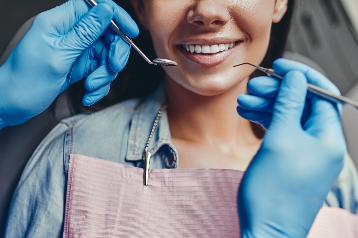 AdobeStock_246187812 v3 woman at a regular dental check up in Pacififc Grove CA